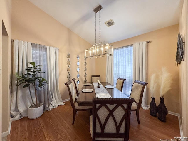 8418 Hera, Universal City, TX 78148 - dining room with dark wood-style flooring, baseboards, and visible vents