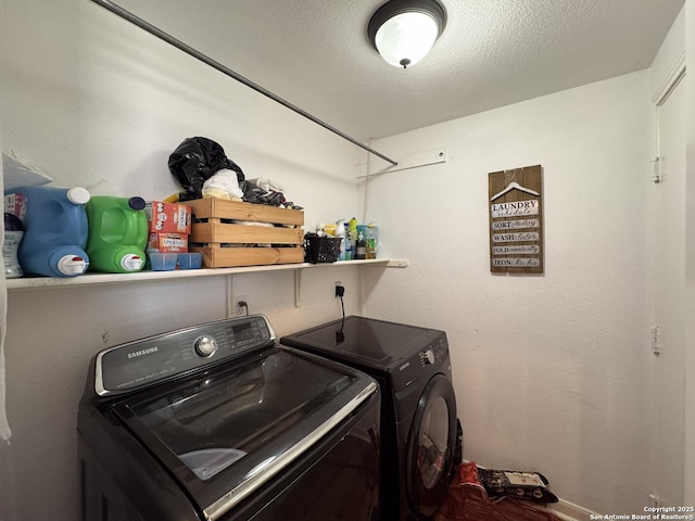 8418 Hera, Universal City, TX 78148 - clothes washing area with separate washer and dryer, laundry area, and a textured ceiling