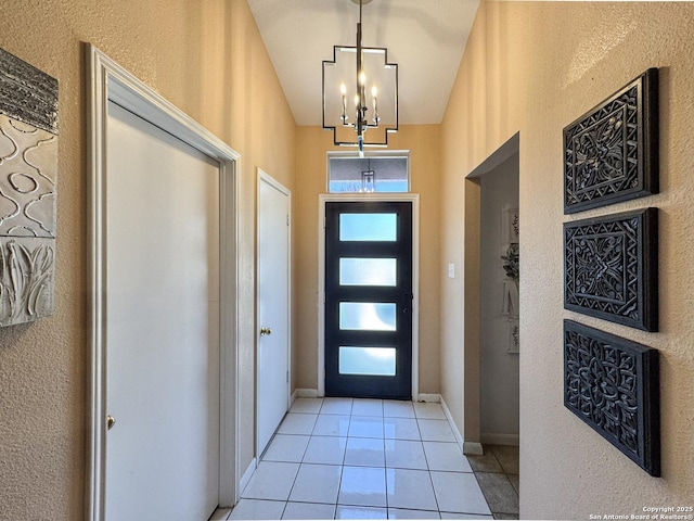 8418 Hera, Universal City, TX 78148 - tiled foyer entrance featuring baseboards and a chandelier