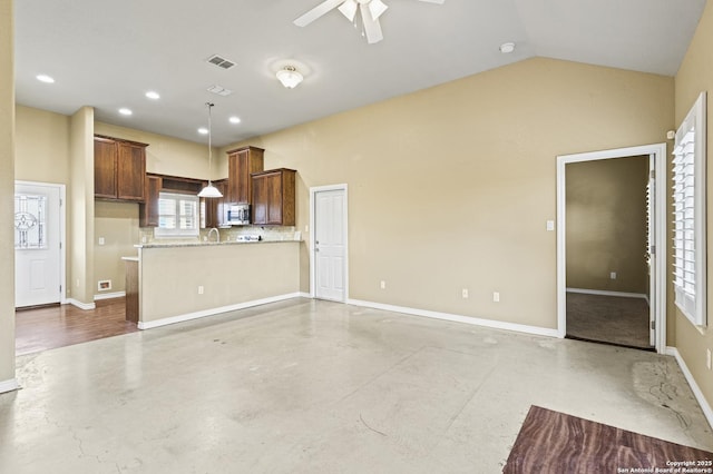 unfurnished living room with concrete flooring, baseboards, a ceiling fan, and visible vents