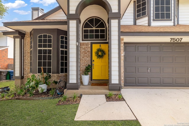 7507 Silent Cloud, San Antonio, TX 78250 - property entrance featuring driveway, a lawn, brick siding, and a chimney