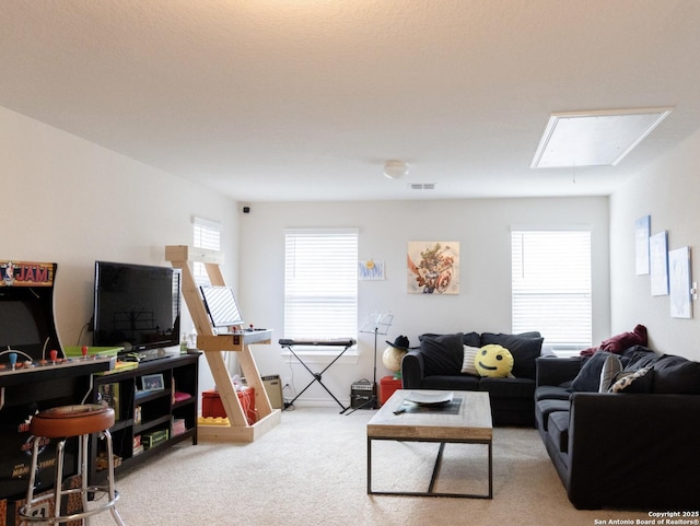13511 Pickett, San Antonio, TX 78254 - living room with visible vents, attic access, and carpet