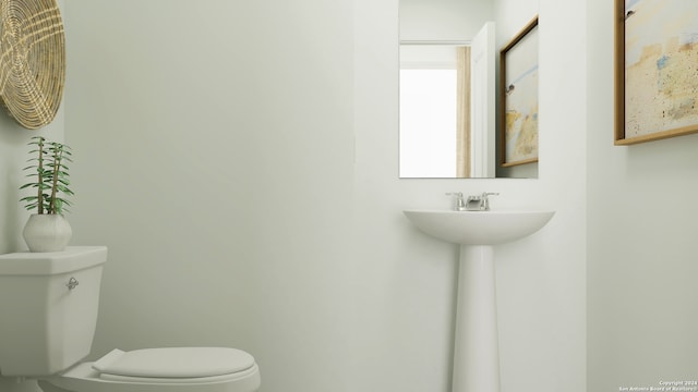 half bathroom with toilet