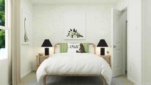 bedroom featuring baseboards and light colored carpet