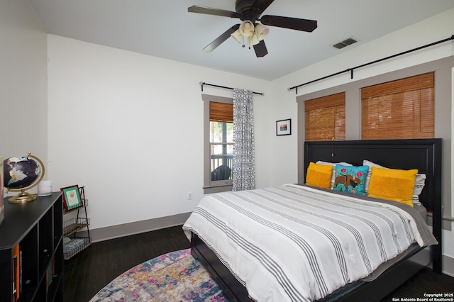 636 W Hollywood Ave, San Antonio, TX 78212 - bedroom featuring visible vents, baseboards, a ceiling fan, and wood finished floors