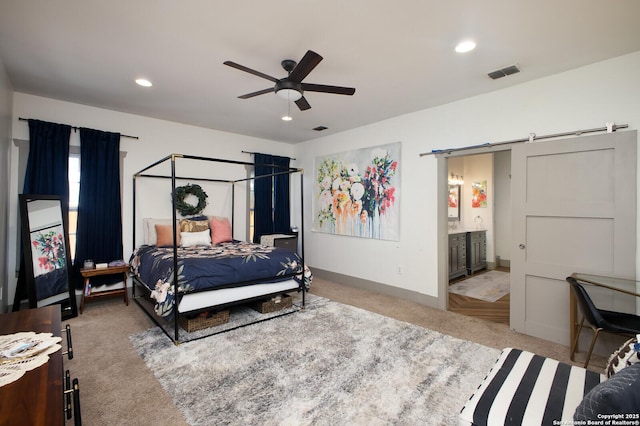 636 W Hollywood Ave, San Antonio, TX 78212 - bedroom with recessed lighting, visible vents, ensuite bathroom, and carpet floors