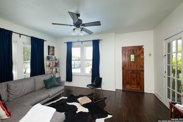 636 W Hollywood Ave, San Antonio, TX 78212 - living area with baseboards, a ceiling fan, and wood finished floors