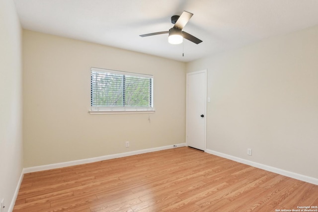 8771 Park Olympia, Universal City, TX 78148 - spare room with light wood-style flooring, a ceiling fan, and baseboards
