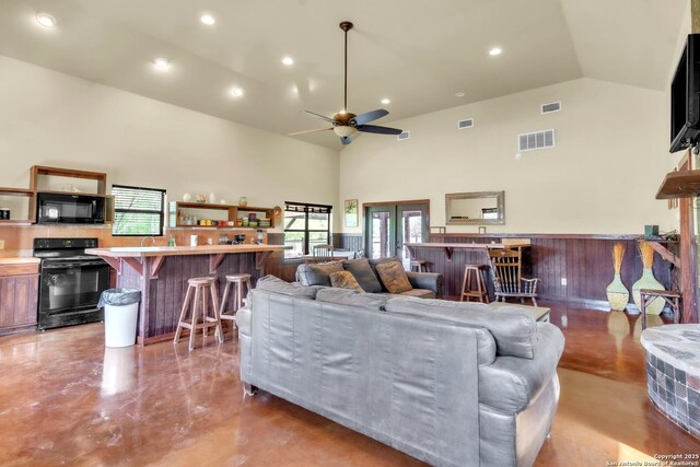 723 Tierra Linda, Concan, TX 78838 - living area with a healthy amount of sunlight, high vaulted ceiling, and visible vents