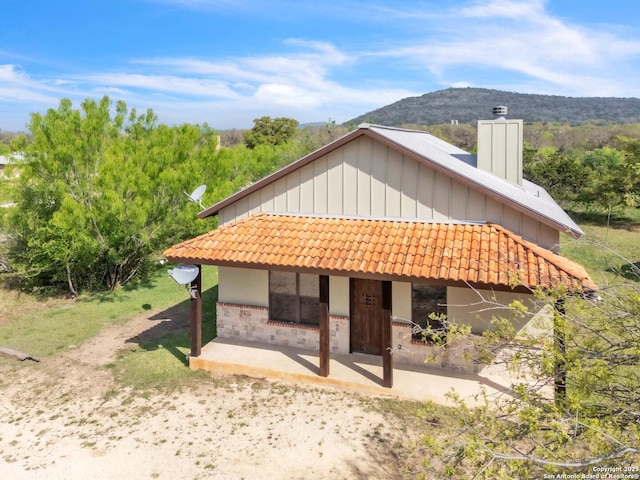 723 Tierra Linda, Concan, TX 78838 - exterior space featuring a patio and a mountain view