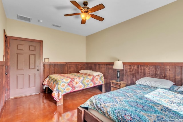 723 Tierra Linda, Concan, TX 78838 - bedroom with visible vents, a ceiling fan, and finished concrete floors
