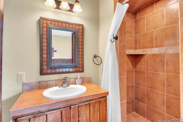 723 Tierra Linda, Concan, TX 78838 - bathroom with vanity and a stall shower