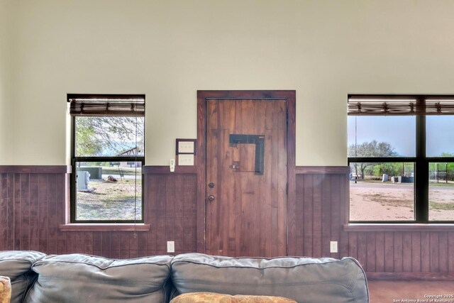 723 Tierra Linda, Concan, TX 78838 - living area with wood walls and wainscoting