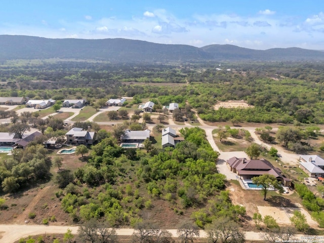 723 Tierra Linda, Concan, TX 78838 - drone / aerial view featuring a mountain view