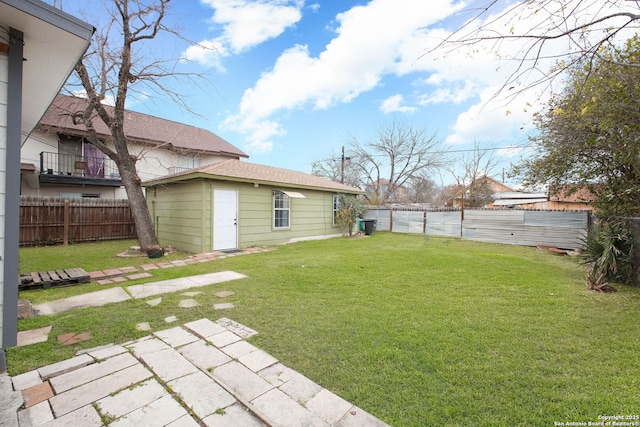 view of yard with a fenced backyard