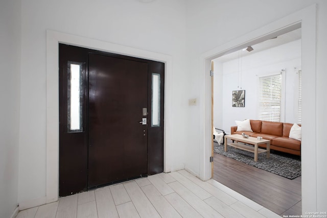 foyer featuring light wood-style flooring