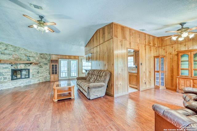 21440 Fm 306, Canyon Lake, TX 78133 - living area with french doors, ceiling fan, wood-type flooring, and visible vents
