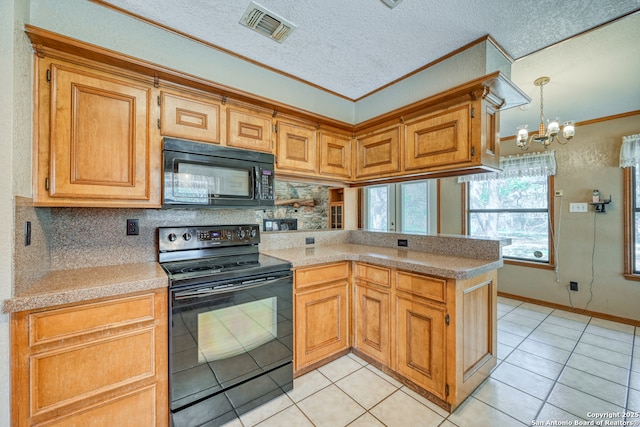 21440 Fm 306, Canyon Lake, TX 78133 - kitchen with a peninsula, light tile patterned floors, light countertops, visible vents, and black appliances