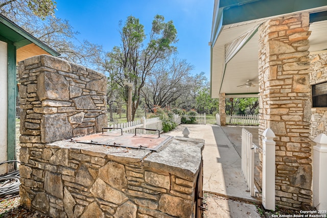 21440 Fm 306, Canyon Lake, TX 78133 - view of patio with fence and a ceiling fan