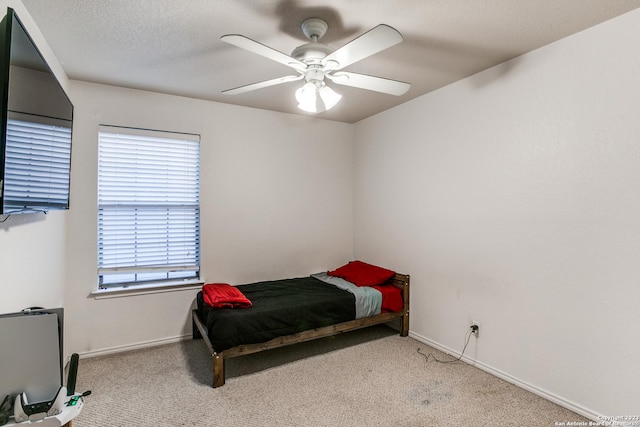 2230 Bedford Stage, San Antonio, TX 78213 - bedroom featuring baseboards, a ceiling fan, and carpet