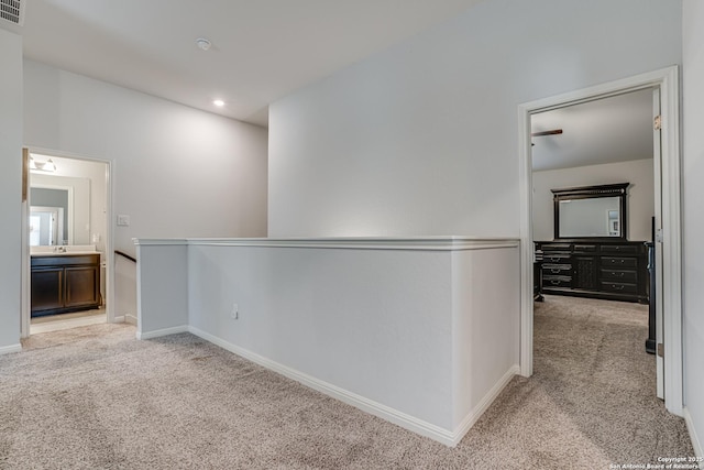 9737 Novacek, San Antonio, TX 78254 - hall featuring visible vents, baseboards, recessed lighting, and light colored carpet