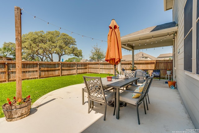 9737 Novacek, San Antonio, TX 78254 - view of patio / terrace featuring outdoor dining area and a fenced backyard