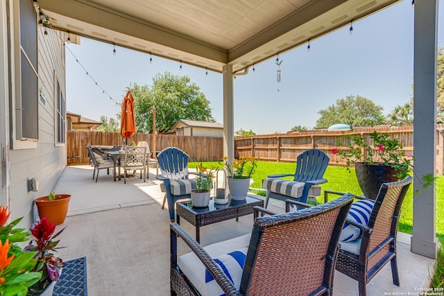 9737 Novacek, San Antonio, TX 78254 - view of patio / terrace featuring outdoor dining space, an outdoor living space, and a fenced backyard