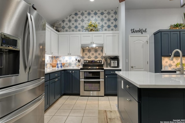 2239 Kensington Way, New Braunfels, TX 78130 - kitchen with a sink, appliances with stainless steel finishes, under cabinet range hood, white cabinetry, and backsplash