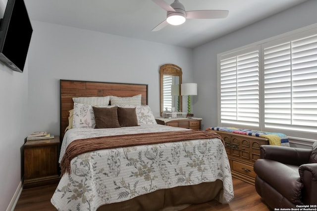 2239 Kensington Way, New Braunfels, TX 78130 - bedroom with wood finished floors, baseboards, and a ceiling fan