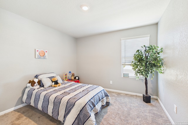 2700 La Mundial, Seguin, TX 78155 - carpeted bedroom featuring baseboards