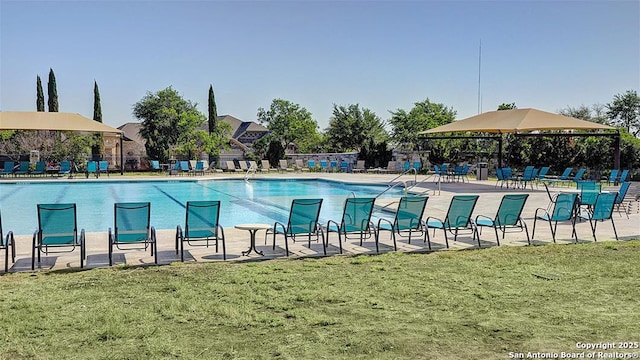12652 Cotorra Spgs, San Antonio, TX 78254 - view of swimming pool with fence, a patio, and a lawn