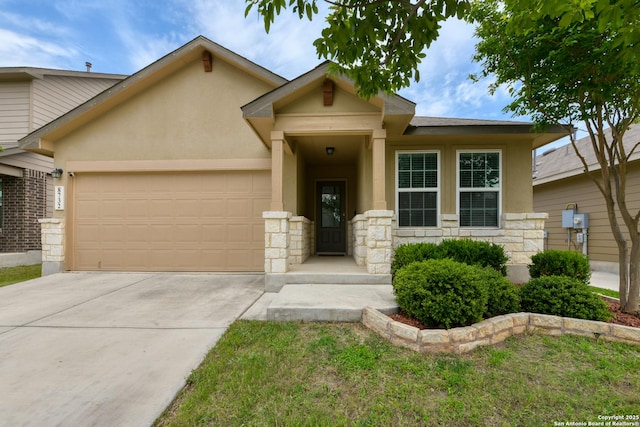 8732 Ironwood Hl, San Antonio, TX 78254 - view of front of home with stucco siding, driveway, stone siding, and a garage