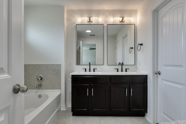 8732 Ironwood Hl, San Antonio, TX 78254 - full bathroom featuring double vanity, a sink, a bath, and tile patterned floors