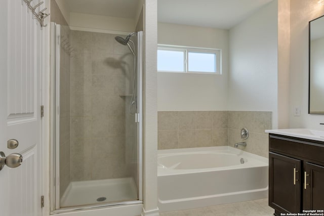 8732 Ironwood Hl, San Antonio, TX 78254 - bathroom featuring vanity, a bath, and a stall shower
