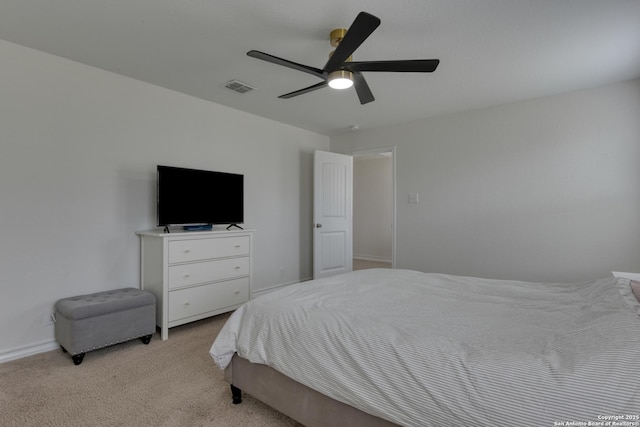 8732 Ironwood Hl, San Antonio, TX 78254 - bedroom with visible vents, a ceiling fan, baseboards, and light colored carpet