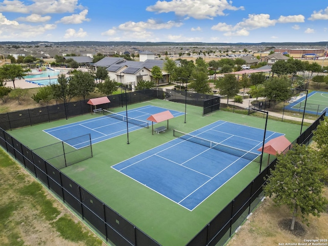 8732 Ironwood Hl, San Antonio, TX 78254 - view of sport court featuring fence and a residential view