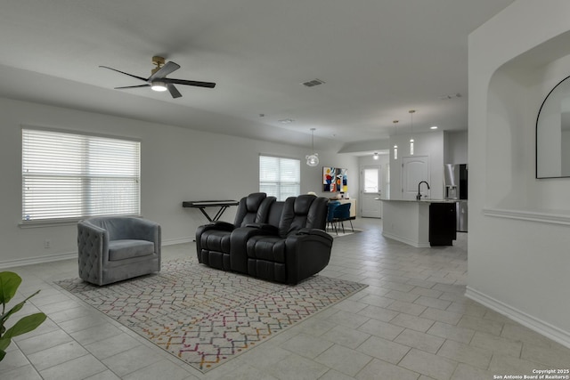 8732 Ironwood Hl, San Antonio, TX 78254 - living room with ceiling fan, recessed lighting, baseboards, light tile patterned floors, and visible vents
