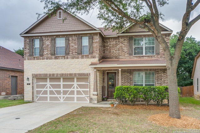 view of front of home with fence, an attached garage, concrete driveway, and brick siding