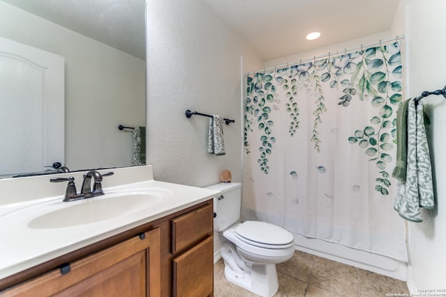 bathroom featuring toilet, shower / tub combo with curtain, and vanity