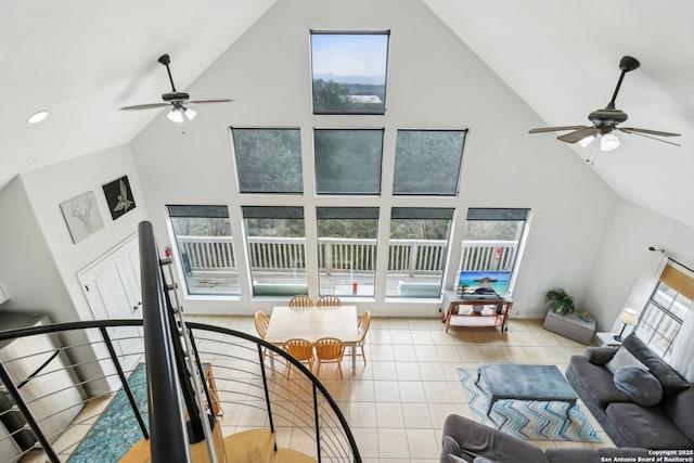 208 Woodridge, Canyon Lake, TX 78133 - tiled living room featuring high vaulted ceiling and ceiling fan