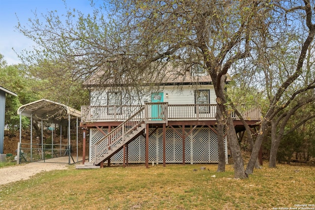 208 Woodridge, Canyon Lake, TX 78133 - back of house featuring dirt driveway, stairs, a yard, a wooden deck, and a detached carport