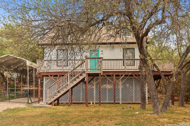 208 Woodridge, Canyon Lake, TX 78133 - back of property featuring a yard, a carport, a deck, and stairs