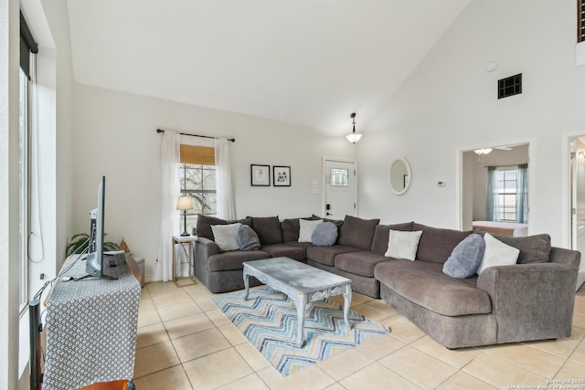 208 Woodridge, Canyon Lake, TX 78133 - living room with high vaulted ceiling, visible vents, and light tile patterned floors