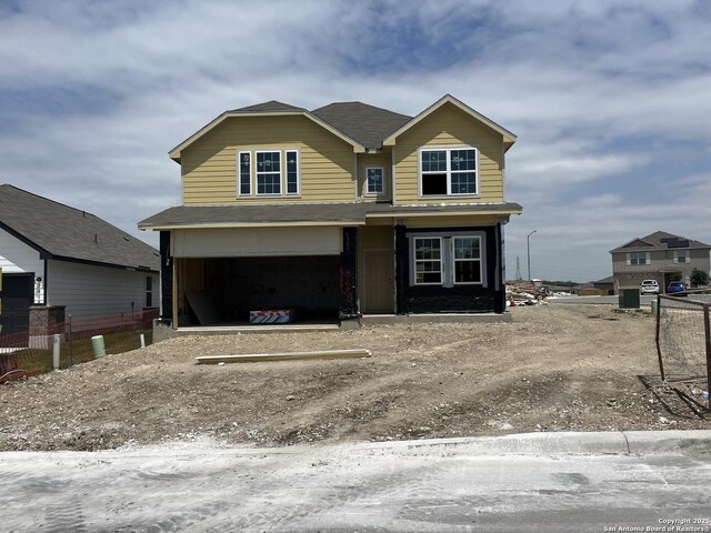 7622 Jacksboro Dr, San Antonio, TX 78252 - view of front of house with an attached garage, roof with shingles, and fence