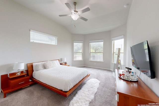 13324 Romulus Way, San Antonio, TX 78245 - bedroom featuring light carpet, lofted ceiling, baseboards, and a ceiling fan