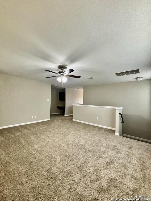 11631 Sangria, San Antonio, TX 78253 - empty room with ceiling fan, baseboards, carpet, and visible vents