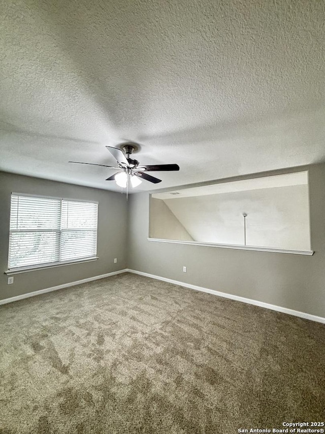 11631 Sangria, San Antonio, TX 78253 - carpeted empty room with a textured ceiling, ceiling fan, and baseboards