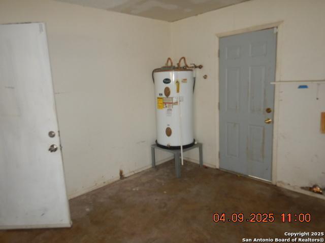 9704 Big Geronimo, San Antonio, TX 78254 - interior space featuring water heater