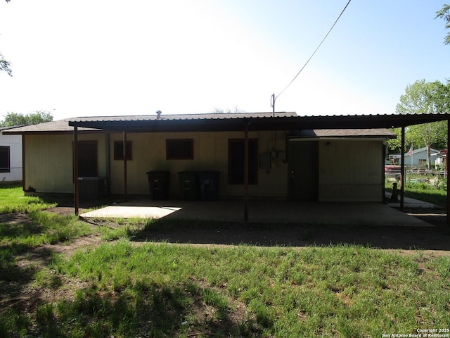 rear view of property with a patio area