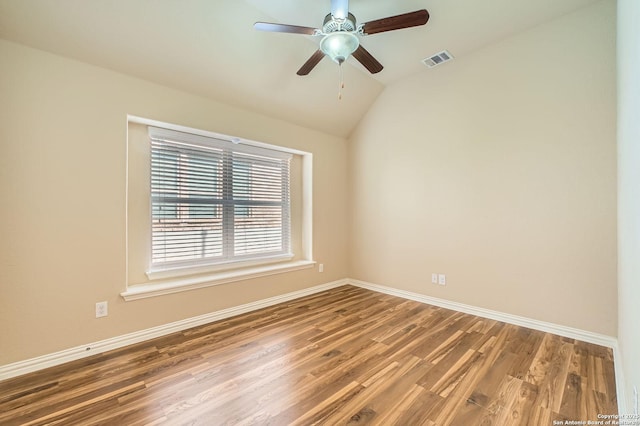 805 Raceland, San Antonio, TX 78245 - empty room featuring visible vents, baseboards, a ceiling fan, wood finished floors, and lofted ceiling
